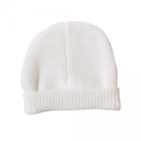 White baby bra with booties and hat